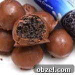 Caramel Oreo Truffles made with caramel, crushed Oreos, and melted chocolate.