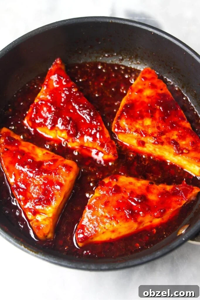 Honey and Harissa Glazed Halloumi Recipe 9 4 wedges of halloumi tossed through red honey harissa sauce.