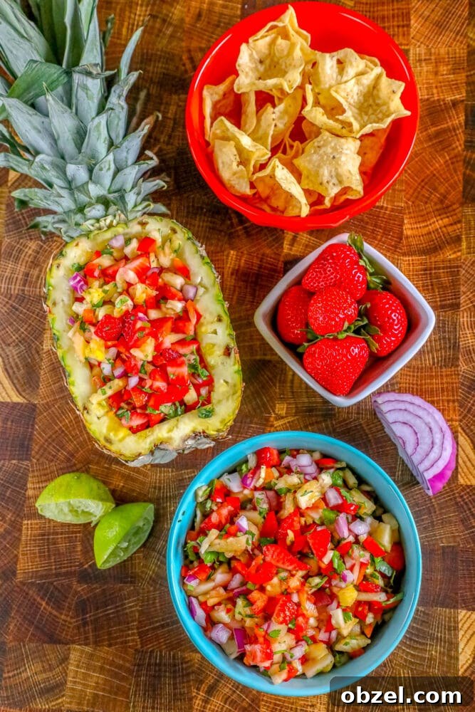 Fresh Pineapple Strawberry Salsa Recipe 2 Pineapple strawberry salsa served in a hollowed-out pineapple