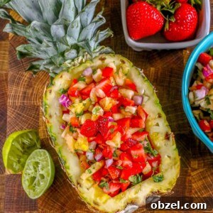 Fresh Pineapple Strawberry Salsa Recipe 18 Pineapple strawberry salsa served in a hollowed-out pineapple