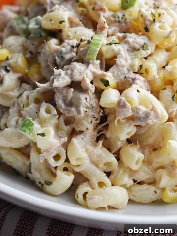 Macaroni salad with tuna and corn on a plate