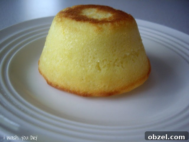 An upside down mini cake on a plate.
