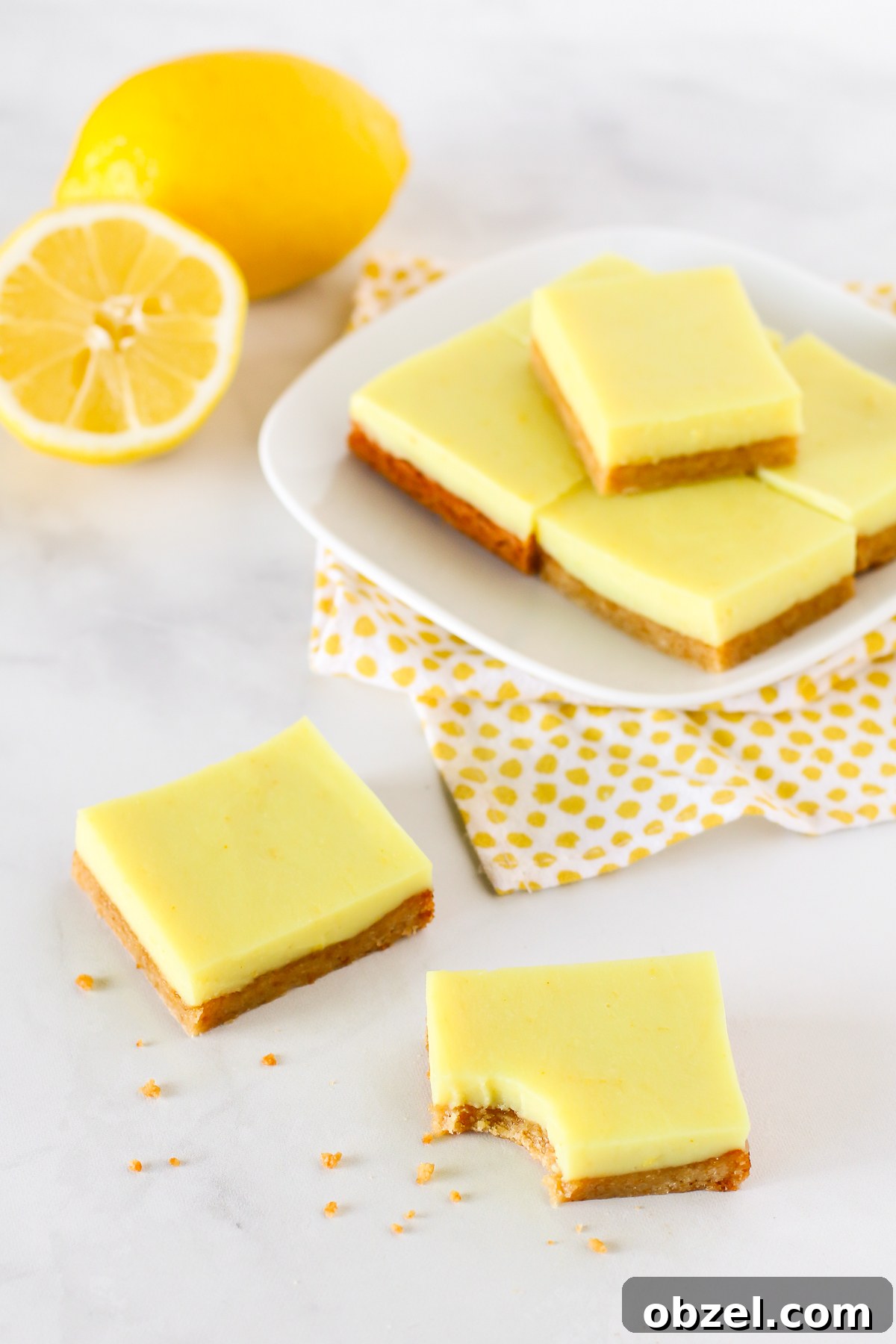 Gluten Free Vegan Lemon Bars. Chewy almond crust with a layer of creamy lemon deliciousness make these lemon bars simply irresistible!