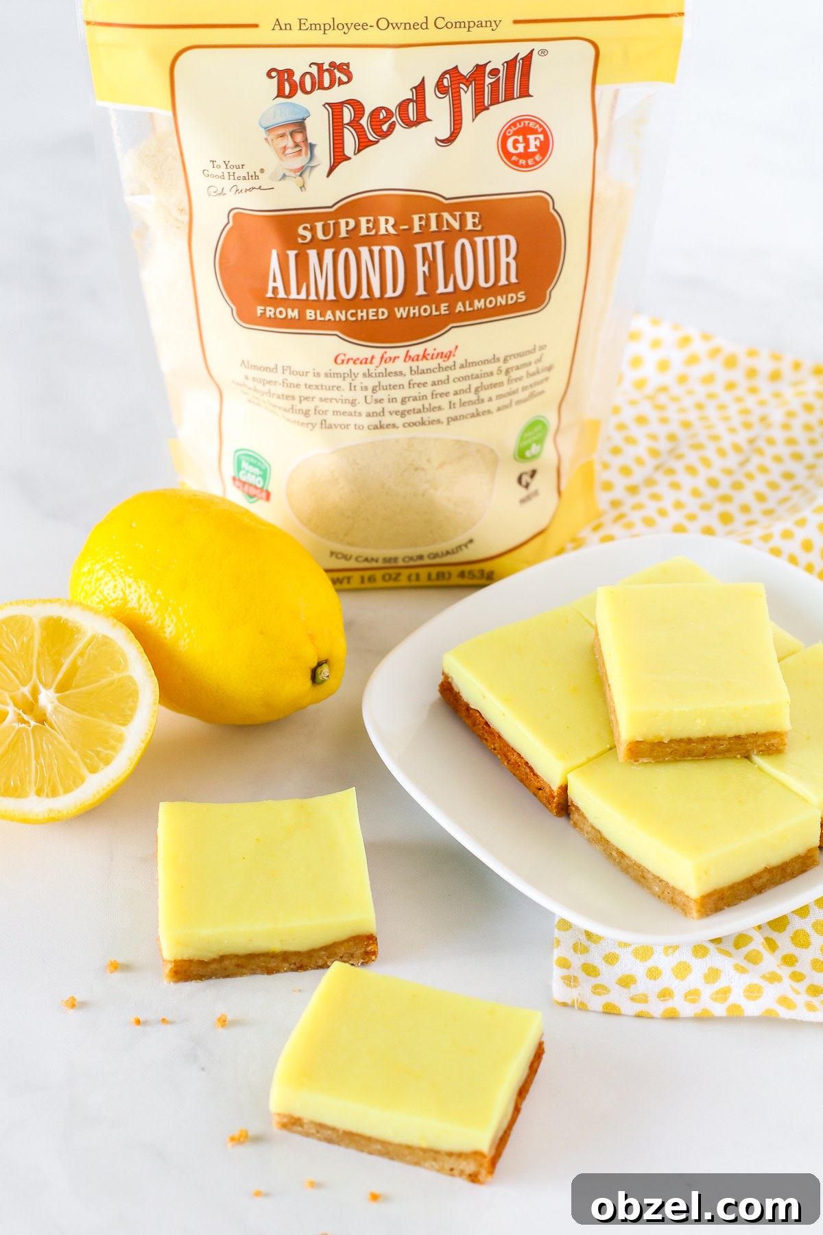 Gluten Free Vegan Lemon Bars. Chewy crust made with almond flour, topped with a creamy layer of lemon deliciousness.