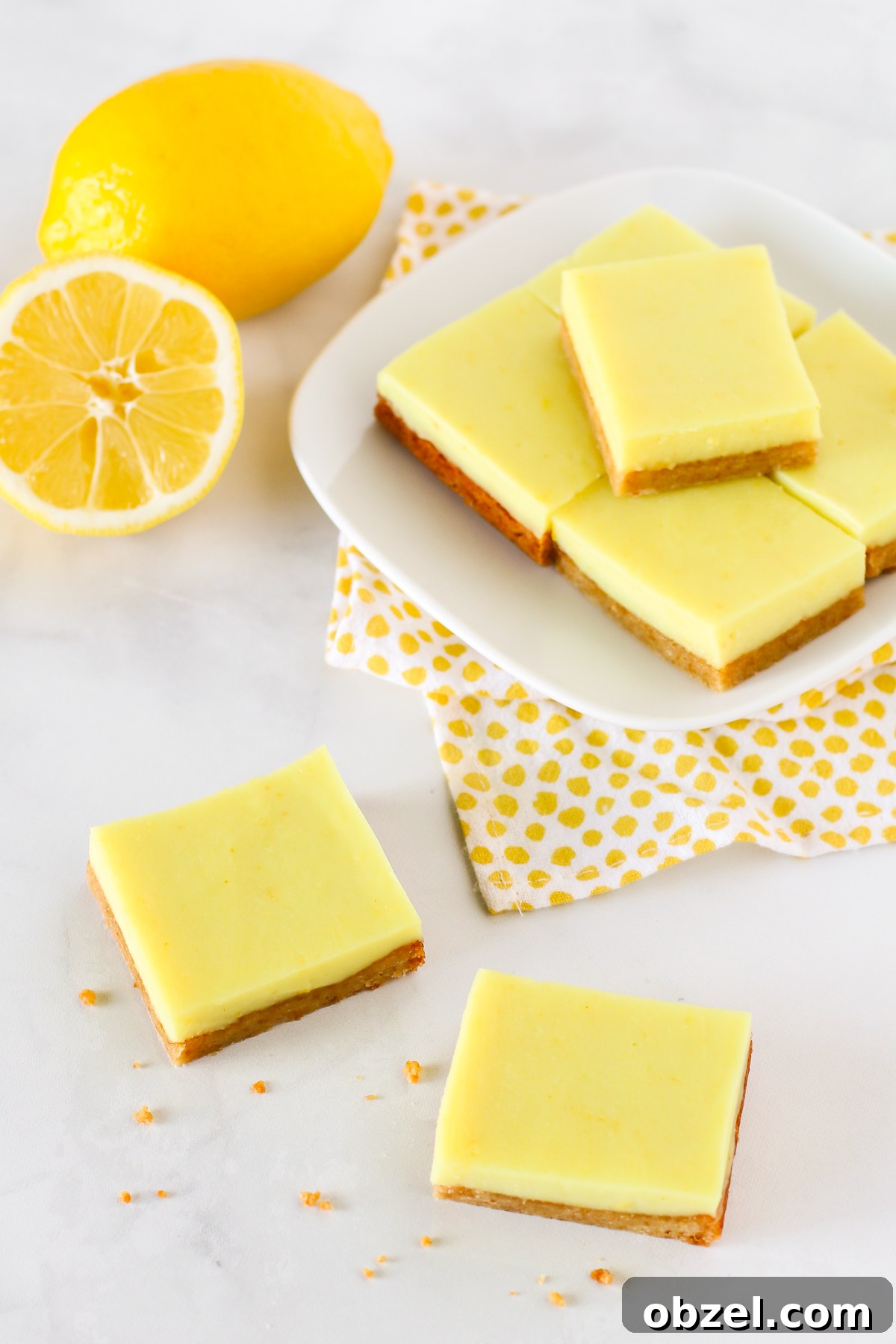 Gluten Free Vegan Lemon Bars. Chewy almond crust with a layer of creamy lemon deliciousness make these lemon bars simply irresistible!