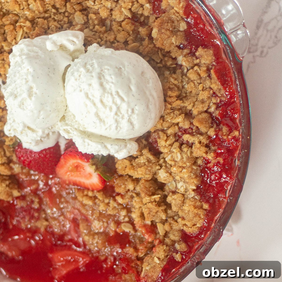 Fresh Strawberry Crisp with Buttery Oat Crumble 2 strawberry crisp in a dish