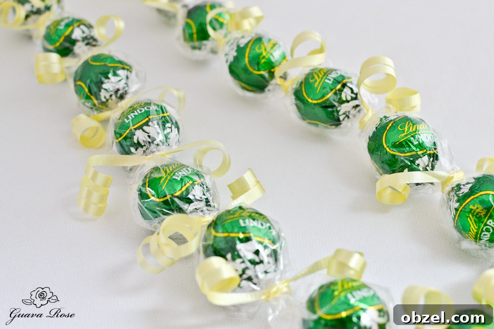 Green Kukui Nut Candy Lei, single curled ribbon Green Kukui Nut Candy Lei, single curled ribbon