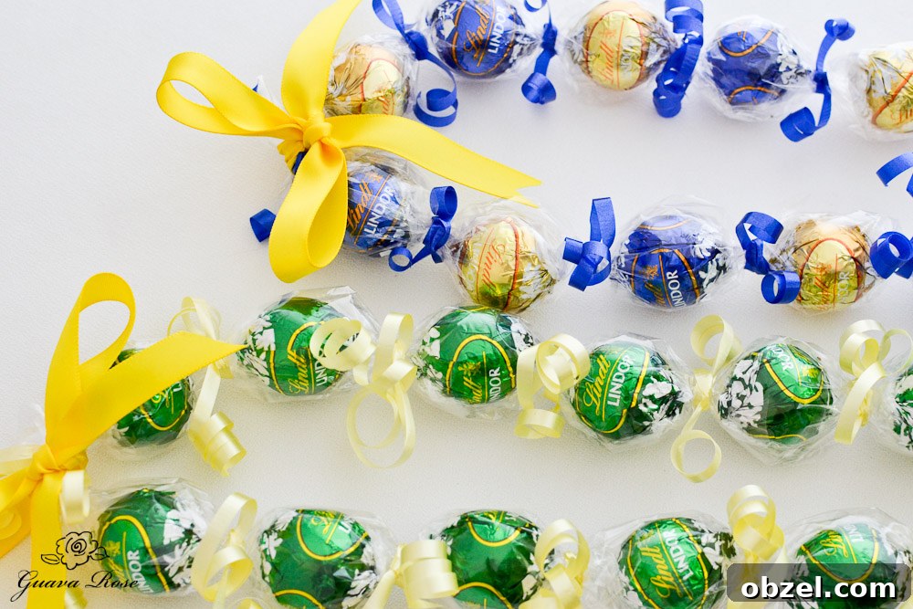 Green & Gold, and Blue & Gold Kukui nut candy leis, single ribbon Green & Gold, and Blue & Gold Kukui nut candy leis, single ribbon