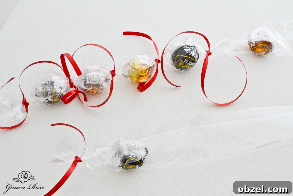 Placing and tying the truffles in the cellophane Placing and tying the truffles in the cellophane