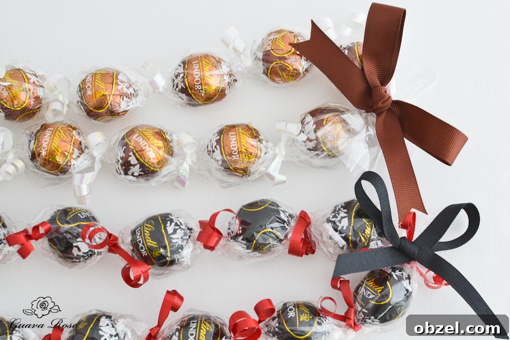 Brown and Black Grossgrain ribbons on plain Kukui nut candy leis Brown and Black Grossgrain ribbons on plain Kukui nut candy leis