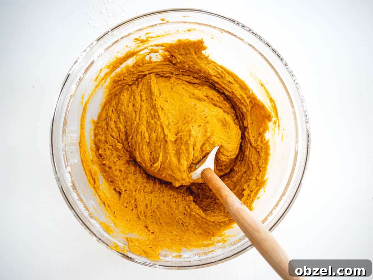 Vegan Pumpkin Muffins with Warm Fall Spices 7 Pumpkin Muffin batter and spatula