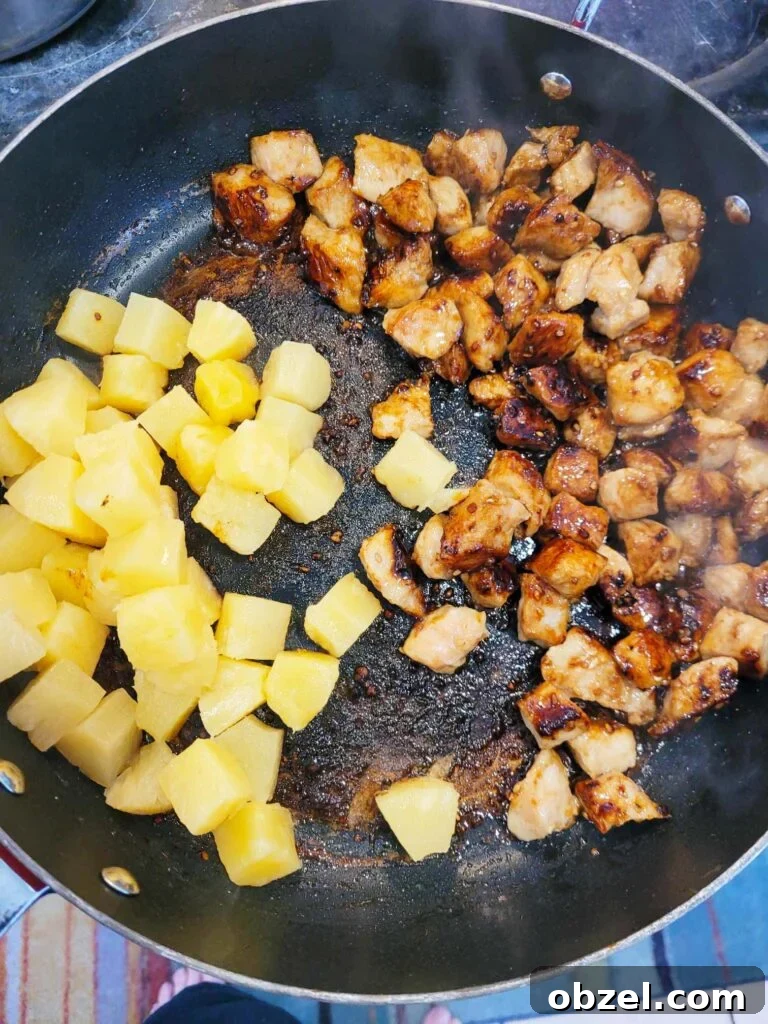 Pineapple Pork Rice Bowl Recipe 7 pineapple and pork cooking in teriyaki sauce