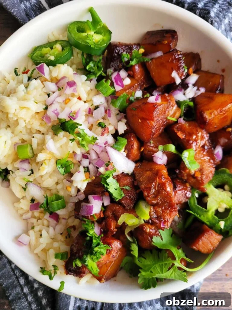 Pineapple Pork Rice Bowl Recipe 8 bowl of pineapple pork and rice with garnish