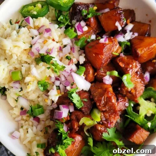 Pineapple Pork Rice Bowl Recipe 9 bowl of pineapple pork and rice with garnish
