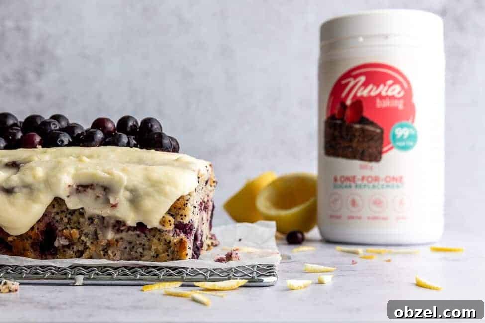 Keto Lemon Poppy Seed Blueberry Cake 4 sliced keto lemon poppy seed cake with blueberries