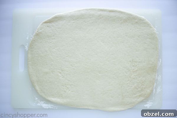 Homemade Cinnamon Rolls Recipe with Cream Cheese Frosting 13 Rolled dough