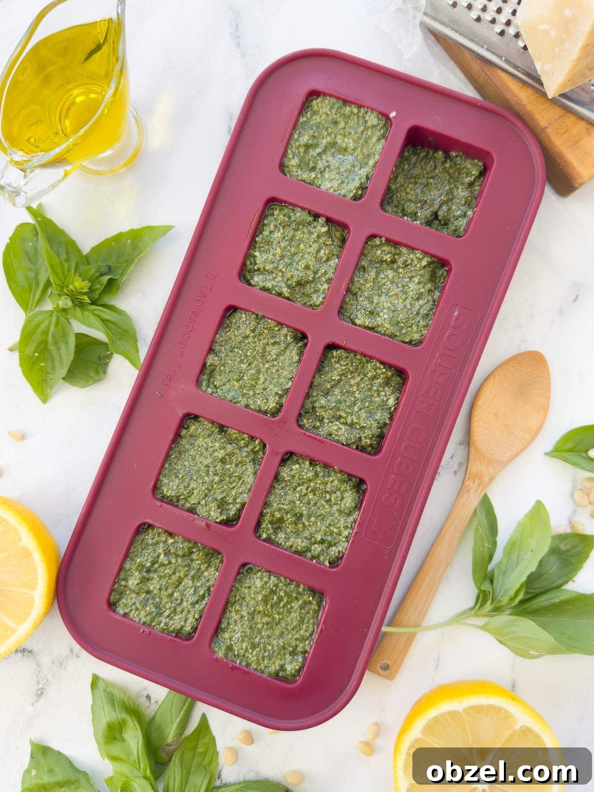 Authentic Pesto alla Genovese Recipe 6 Bright green basil pesto in a freezer tray.