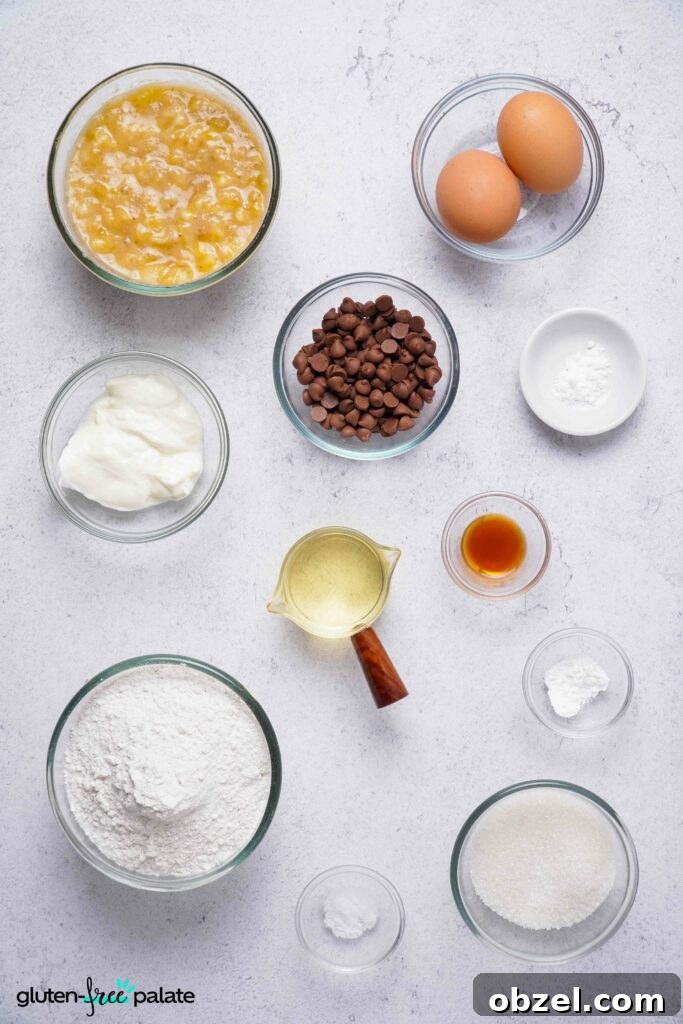 Moist Gluten-Free Banana Bread Recipe 4 Gluten-free banana bread ingredients laid out: overripe bananas, gluten-free flour, eggs, yogurt, oil, sugar, vanilla, baking powder, baking soda, and salt.