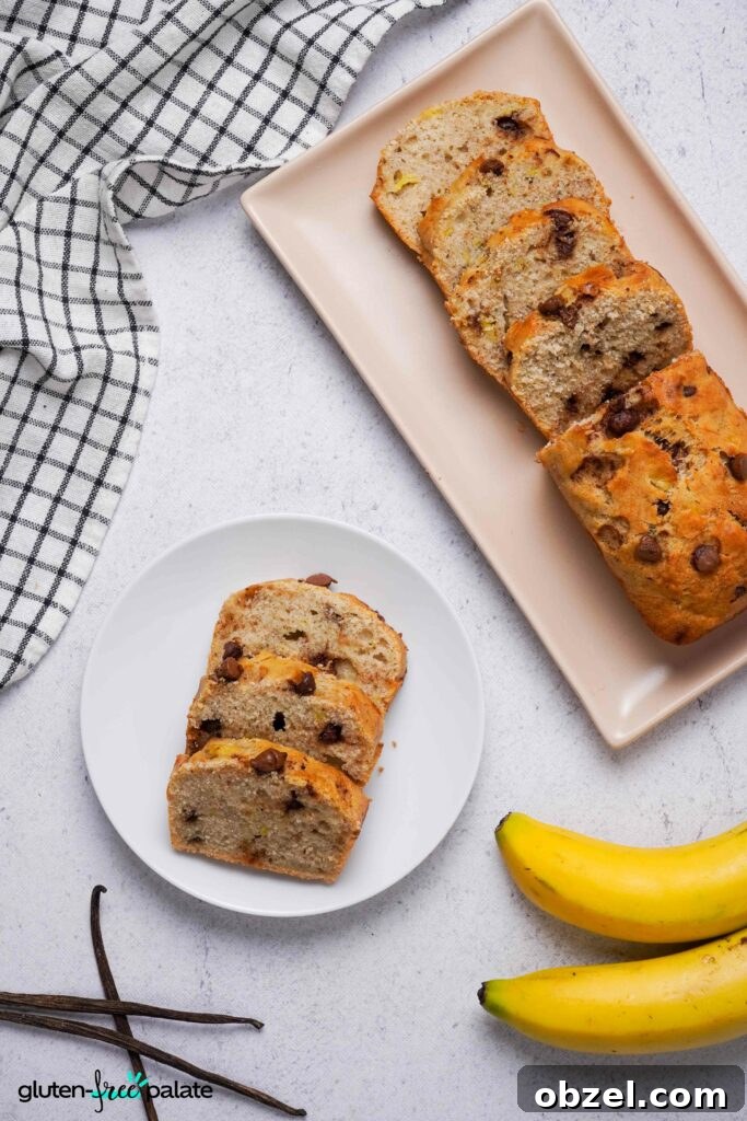 Moist Gluten-Free Banana Bread Recipe 7 Sliced gluten-free banana bread on a side plate next to a full loaf on a bread board.