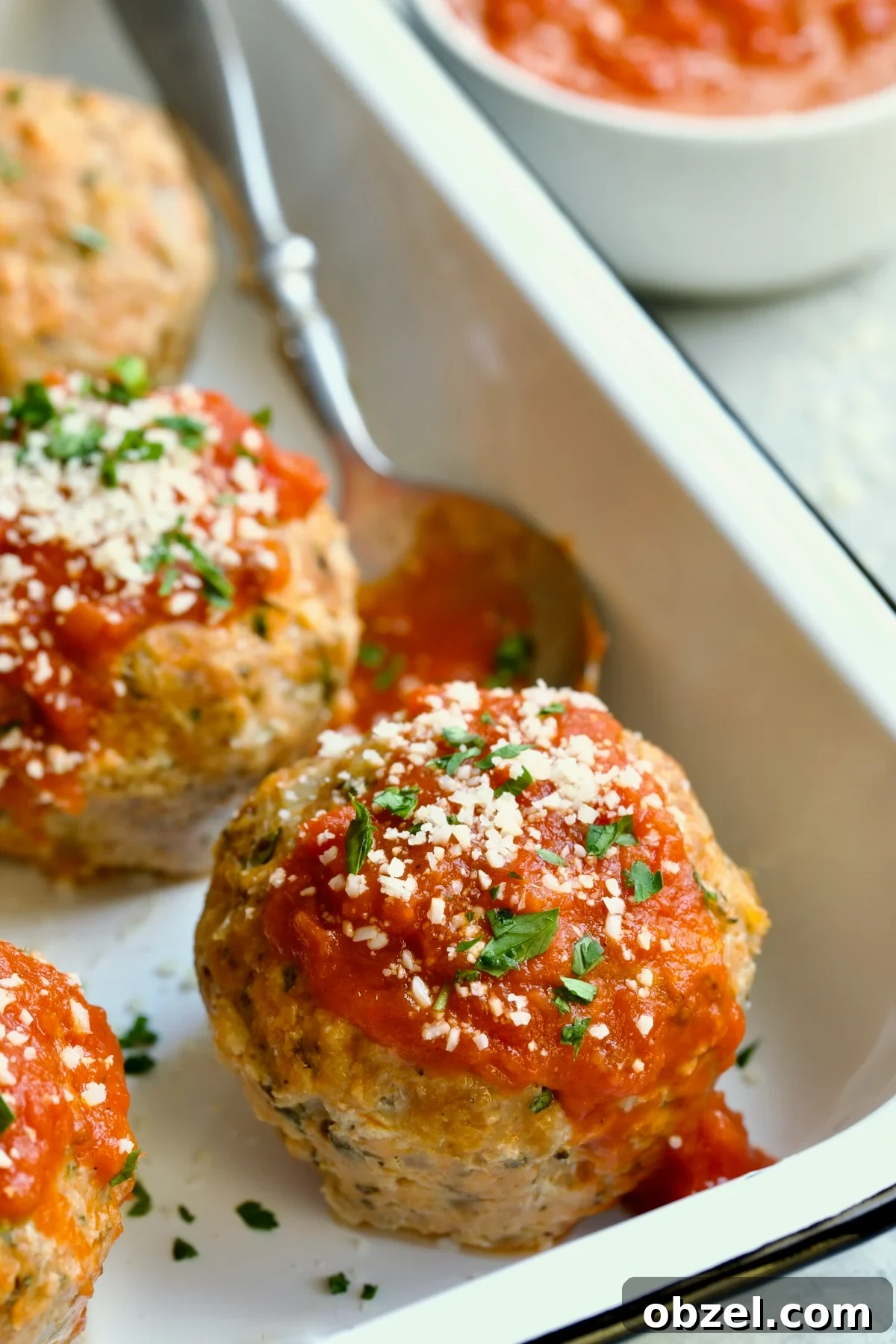 Mini Turkey Meatloaf Muffins Recipe 3 Three Turkey Meatloaf Muffins in white enamel pan.