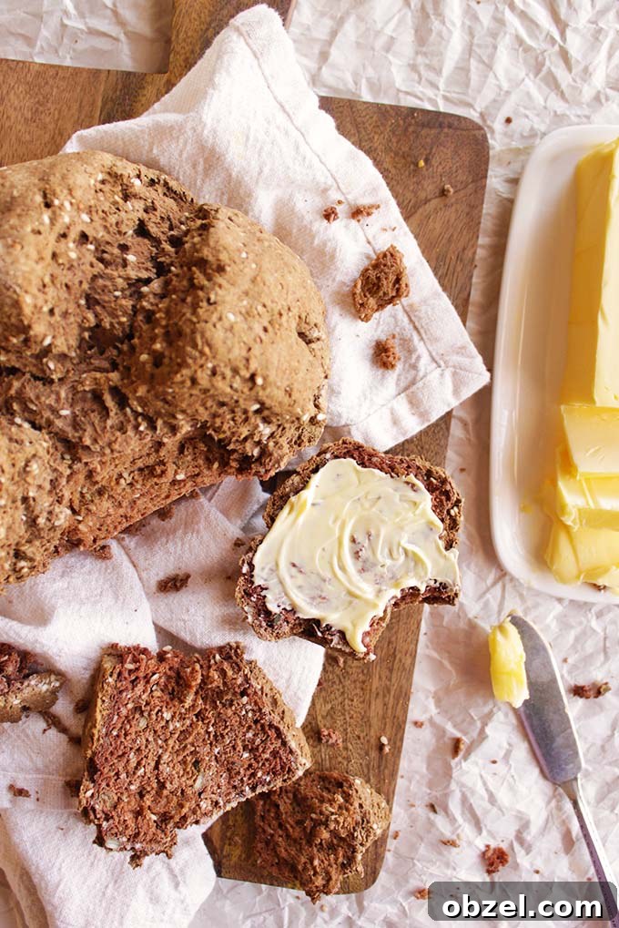 A gluten free version of a traditional Irish bread, brown soda bread. Hearty, rustic, perfect for dipping in soups and best spread with butter. Easy to make, no yeast, rising, or kneading required! 10 minutes to put together and 40 minutes to bake! Also, with a dairy free option. So yum!!!! | robustrecipes.com 