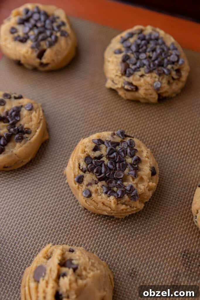 Chewy Peanut Butter Chocolate Chip Cookies 10 baked goods on baking sheet