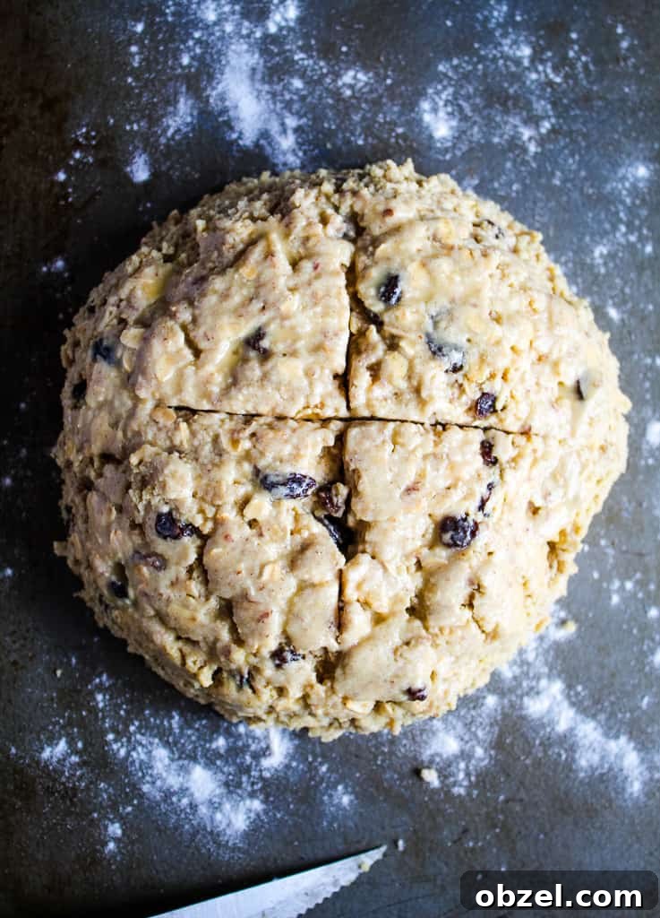 Gluten Free Irish Soda Bread Recipe for Perfect Loaves 7 bird's eye view of Irish soda bread unbaked dough with a cross cut into the top