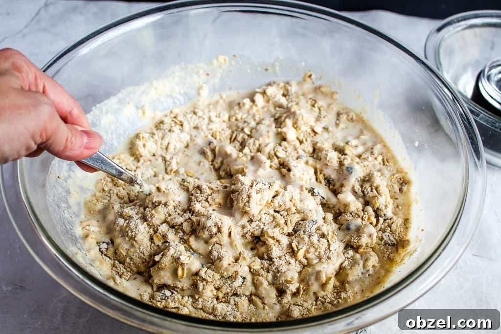 Gluten Free Irish Soda Bread Recipe for Perfect Loaves 9 clear glass bowl of bread batter mixed
