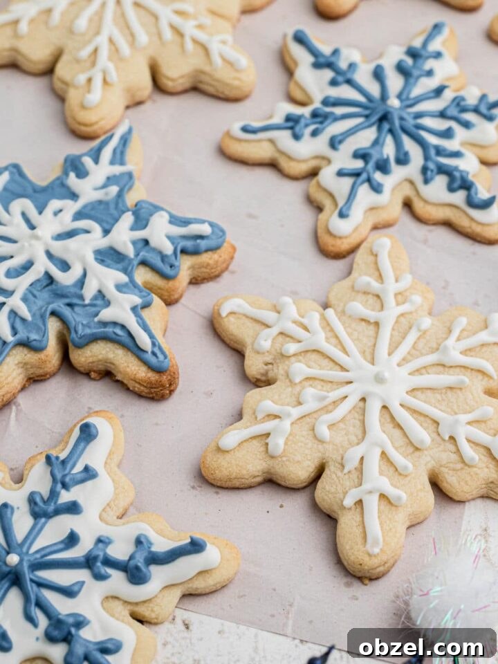 Close up shot of some snowflake cookies cropped square.